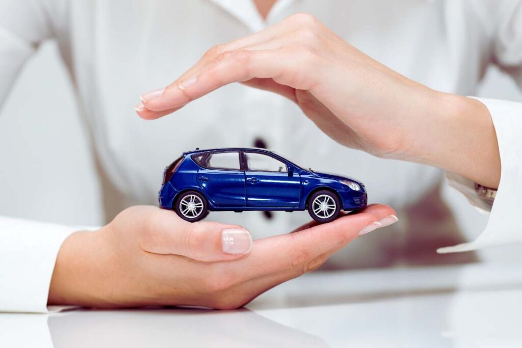 mani con automobile