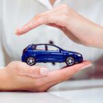 mani con automobile